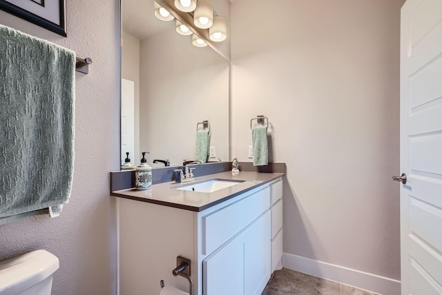 13224 N Salmon River Cir, Humble, TX 77346 - bathroom featuring tile patterned floors, toilet, vanity, and baseboards