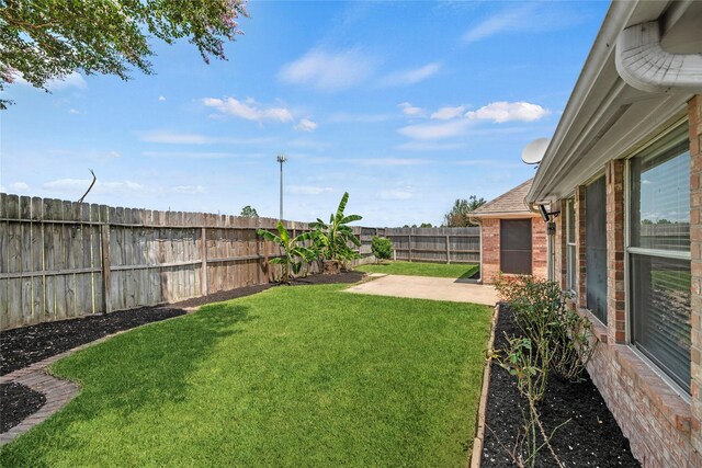 view of yard with a patio area