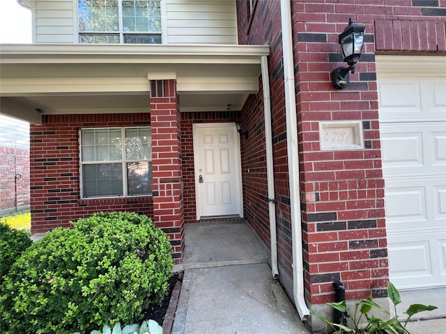 entrance to property with a garage