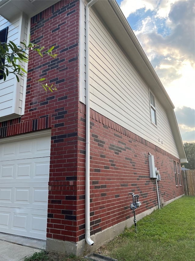 view of home's exterior with a garage