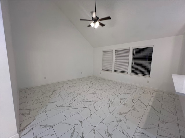 interior space with vaulted ceiling and ceiling fan