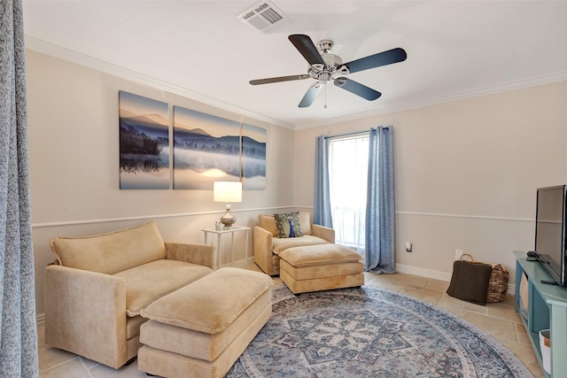 living area with light tile patterned flooring, ceiling fan, baseboards, ornamental molding, and visible vents
