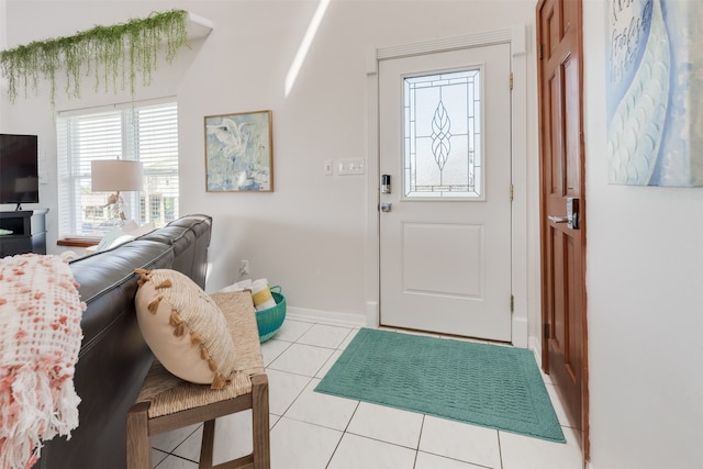 entryway featuring light tile patterned floors