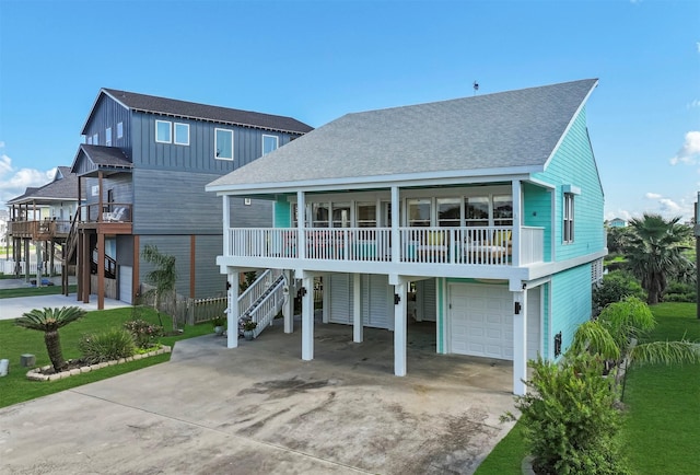 view of front of house featuring a garage and covered porch