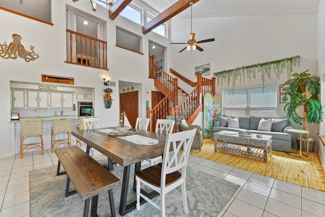 dining room with light tile patterned flooring, plenty of natural light, and ceiling fan