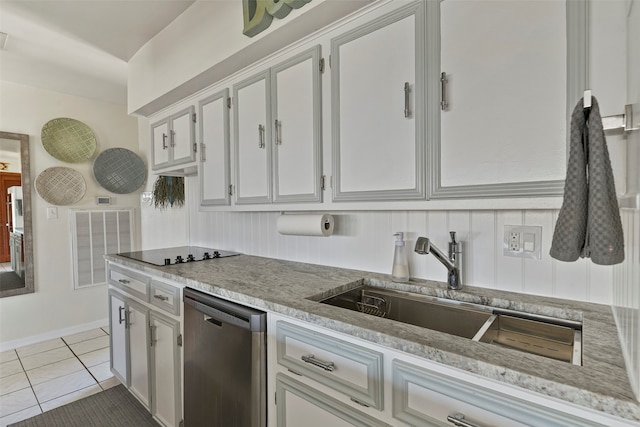 kitchen featuring light tile patterned flooring, white cabinetry, sink, stainless steel dishwasher, and black electric cooktop