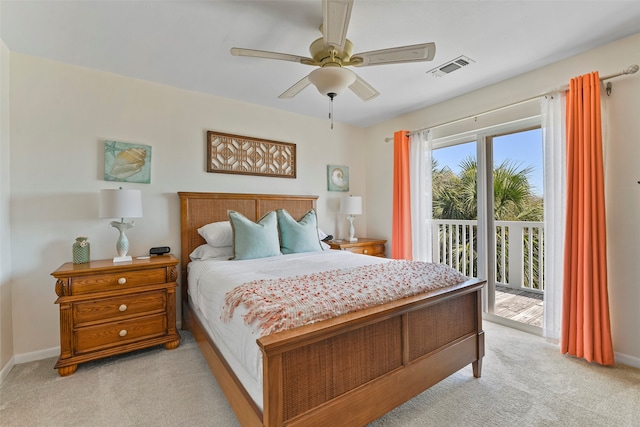 bedroom featuring light carpet, access to outside, and ceiling fan