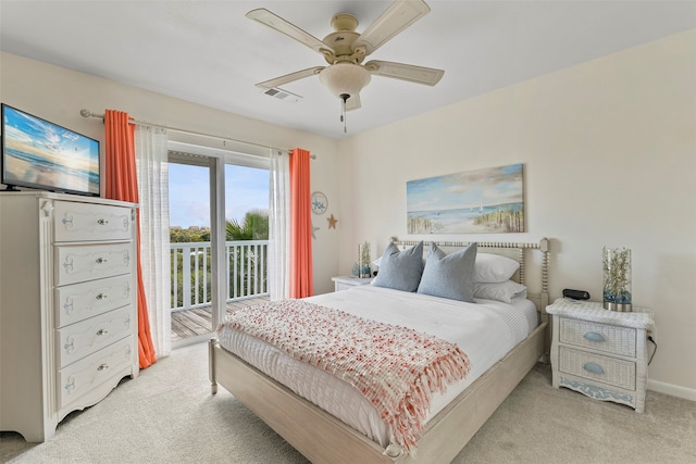 carpeted bedroom with access to outside and ceiling fan