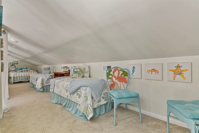 carpeted bedroom featuring lofted ceiling