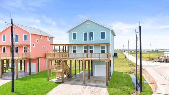 view of front of house with a garage and a front lawn