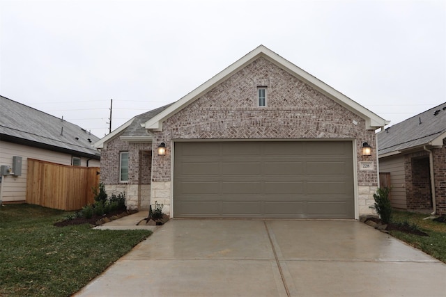 ranch-style house featuring a garage