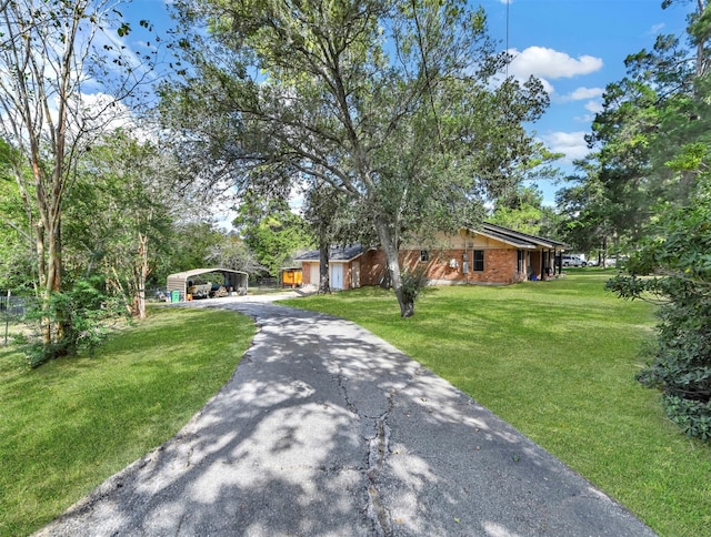 ranch-style house with a front lawn and a carport