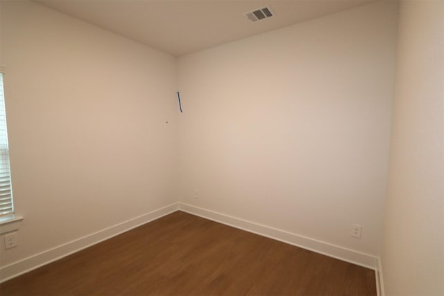 empty room featuring hardwood / wood-style floors