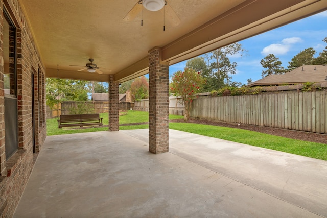 view of patio / terrace featuring ceiling fan