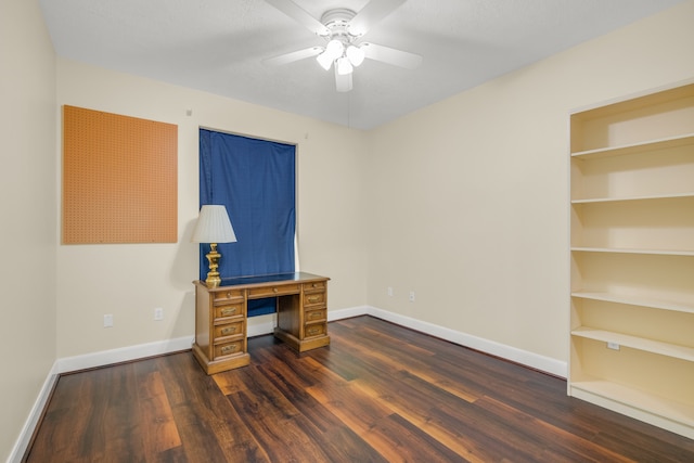 office with dark hardwood / wood-style flooring and ceiling fan