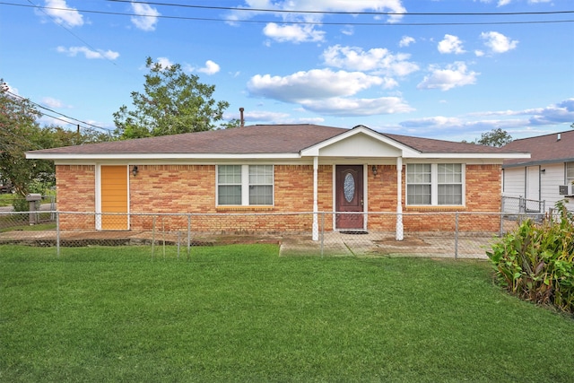 single story home with a front yard