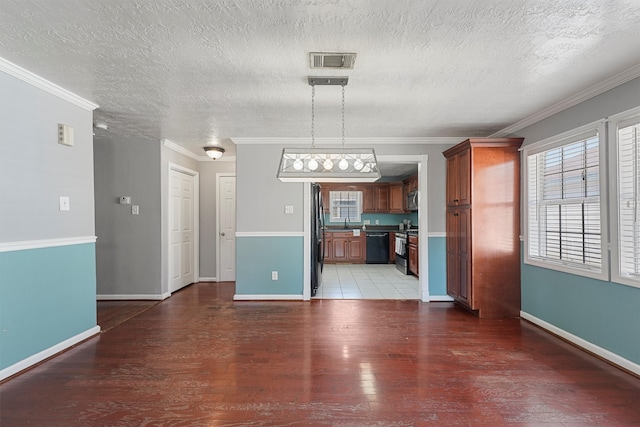 unfurnished living room with a textured ceiling, dark hardwood / wood-style floors, ornamental molding, and sink