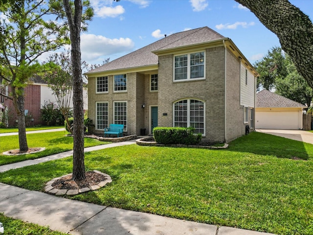 view of front of home with a garage, brick siding, and a front yard