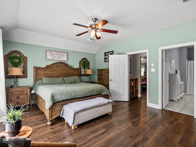 bedroom with lofted ceiling, visible vents, ceiling fan, wood finished floors, and baseboards