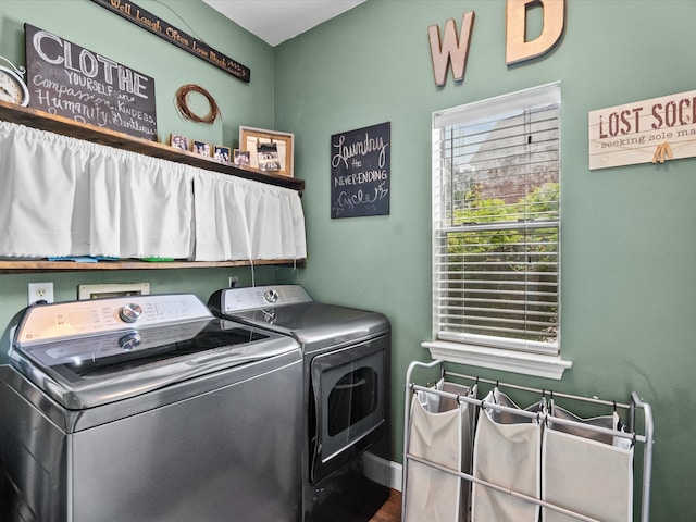 washroom with laundry area and separate washer and dryer