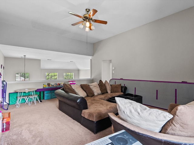 living room with ceiling fan and carpet flooring