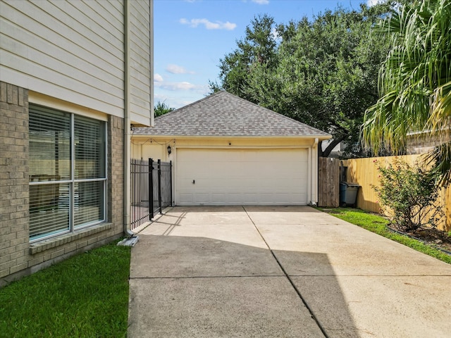 garage featuring fence