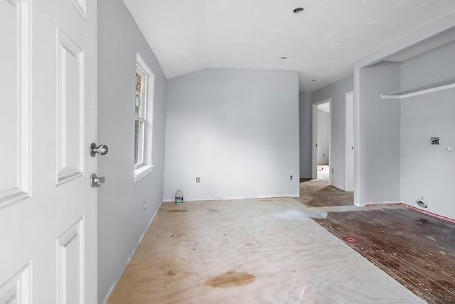 foyer entrance featuring lofted ceiling