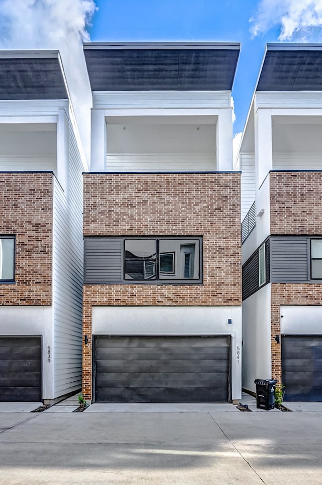 contemporary house featuring a garage