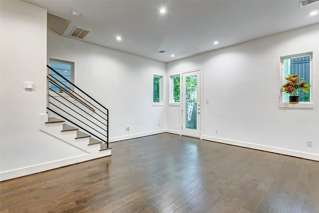 interior space with dark hardwood / wood-style flooring