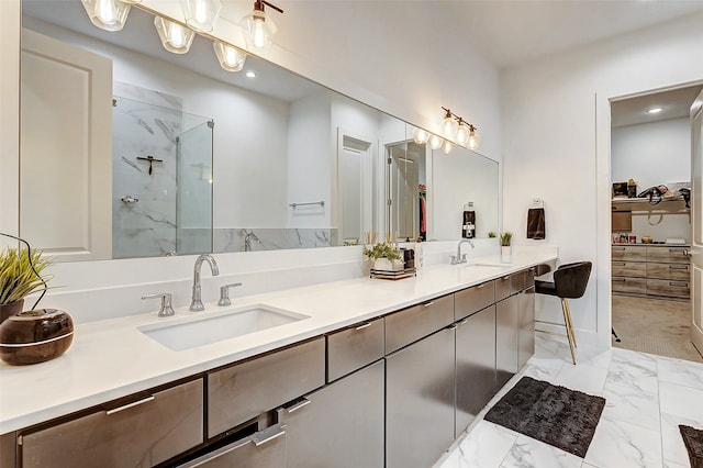 bathroom featuring vanity and a shower with shower door