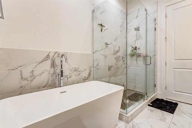 bathroom with plus walk in shower and tile walls