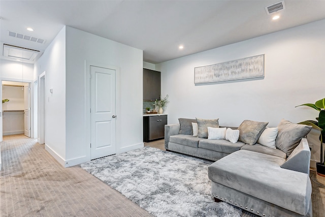 living room with light colored carpet