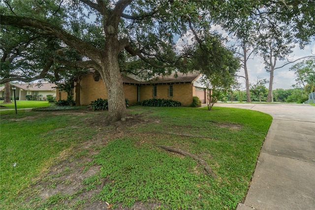 exterior space featuring a lawn