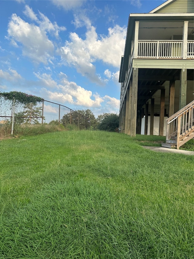 view of yard with a deck