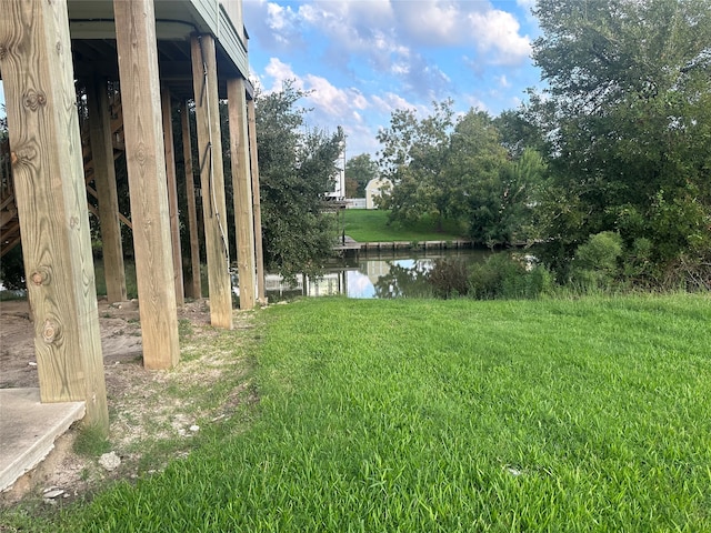 view of yard with a water view