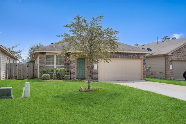 ranch-style home featuring a front lawn and a garage