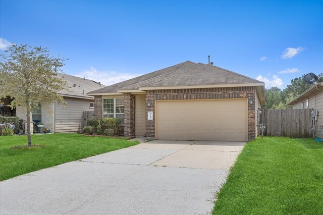 ranch-style house featuring a garage and a front lawn