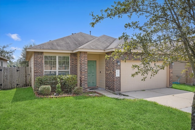 single story home featuring a garage and a front lawn