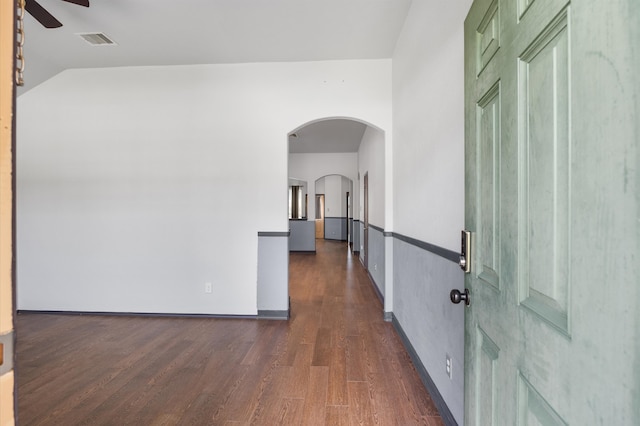 corridor featuring dark wood-type flooring