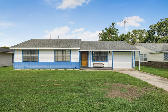 ranch-style home featuring a front yard and a garage