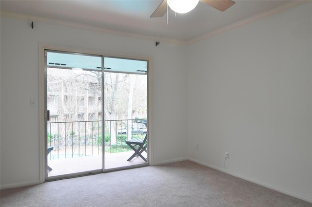 empty room with light carpet, ceiling fan, and ornamental molding