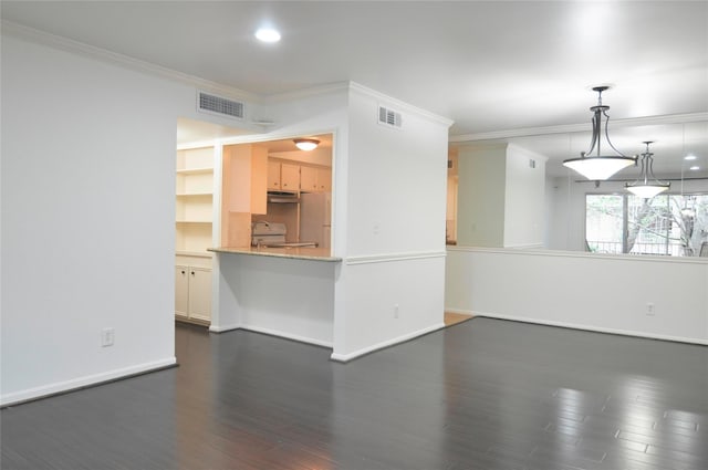 unfurnished room with dark hardwood / wood-style floors and ornamental molding