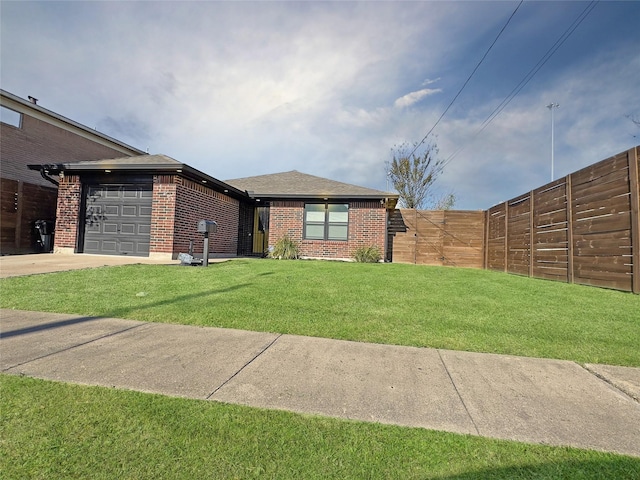 view of front facade featuring a front yard and a garage