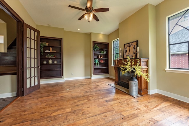 interior space featuring ceiling fan and light hardwood / wood-style flooring