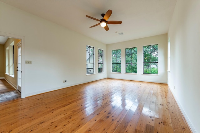 unfurnished room featuring ceiling fan and light hardwood / wood-style flooring