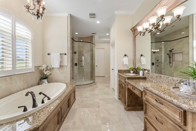 bathroom with vanity, crown molding, a healthy amount of sunlight, and shower with separate bathtub