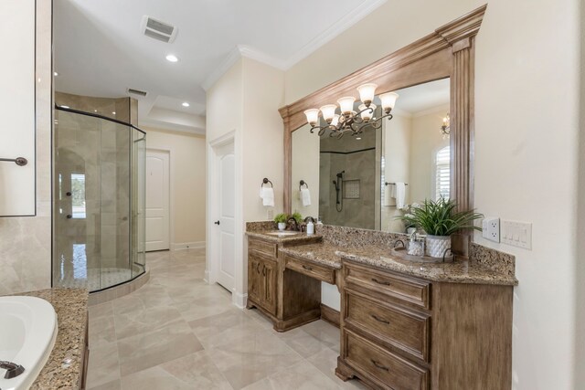 bathroom featuring vanity, crown molding, an inviting chandelier, and shower with separate bathtub