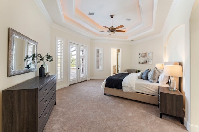 bedroom with access to outside, french doors, ceiling fan, light carpet, and connected bathroom