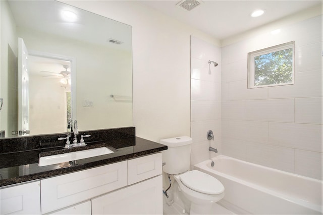 full bathroom featuring visible vents, a ceiling fan, shower / bathing tub combination, and toilet