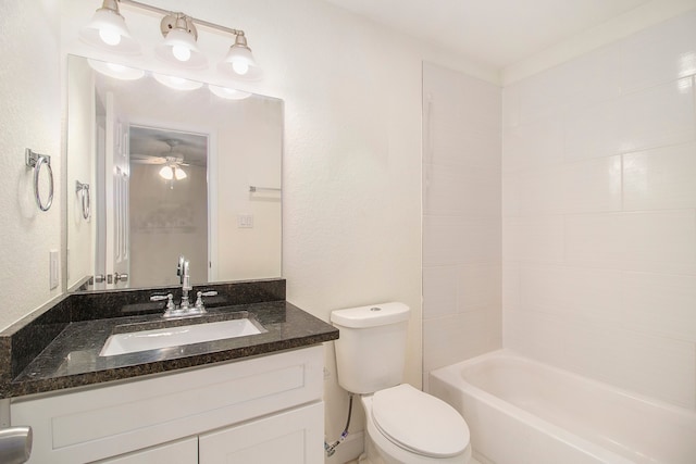 full bathroom featuring bathing tub / shower combination, vanity, toilet, and ceiling fan